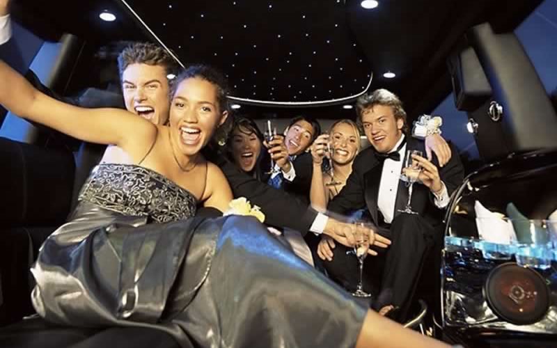 kids in a prom limo have a party