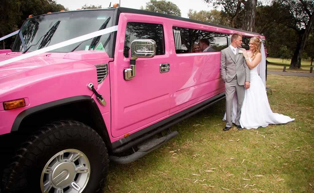 Pink Hummer H2 wedding limo