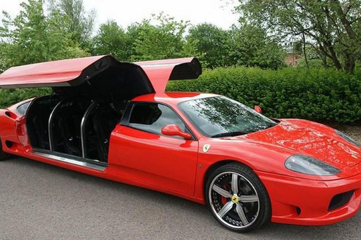 Ferrari stretch limo three quarter side with gullwing doors open