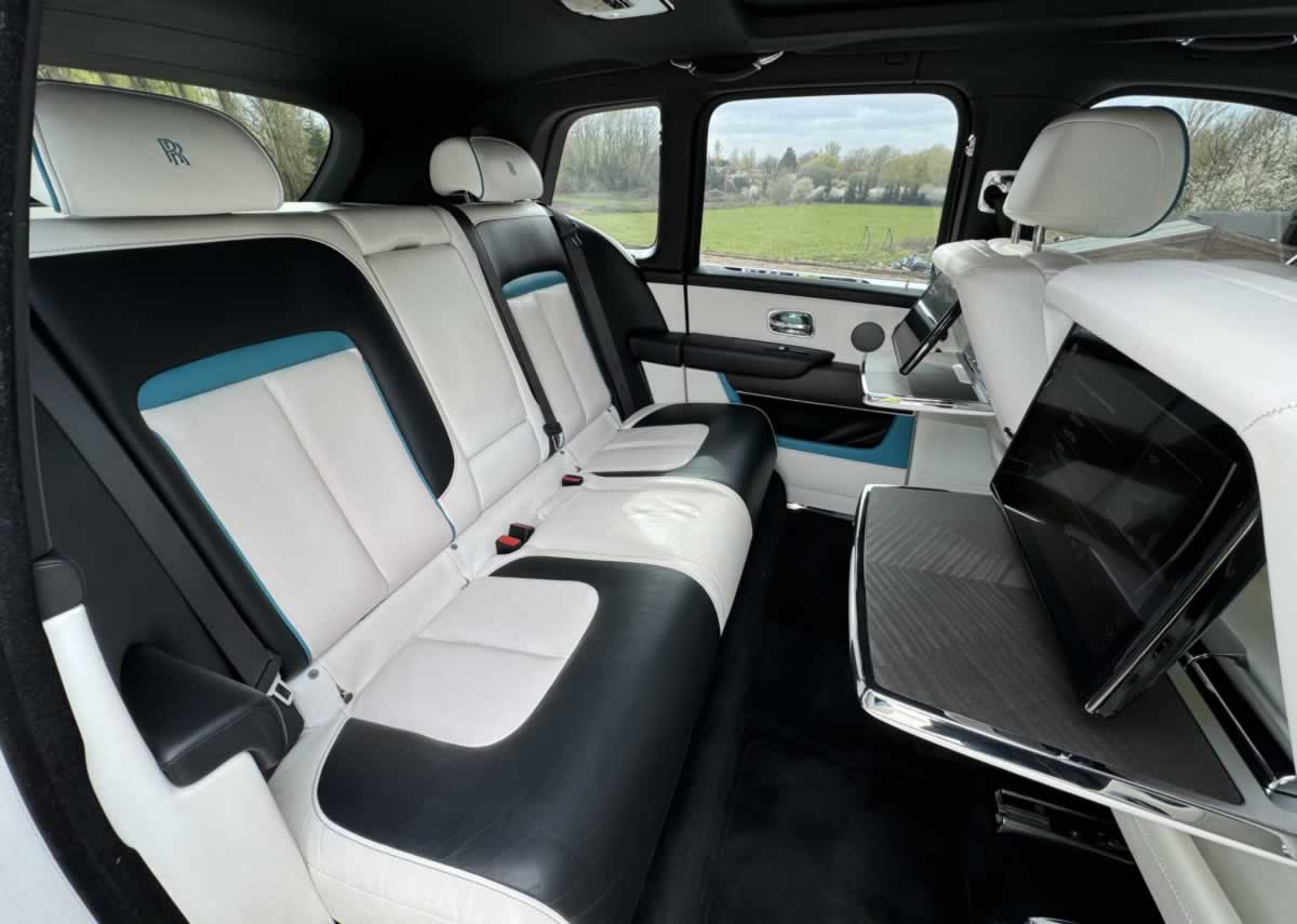 White Rolls-Ropyce Cullinan with white & turquoise leather seating