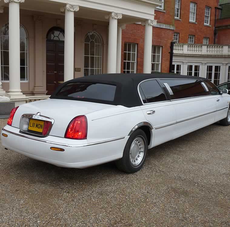 white Lincon Town Car Limo rear